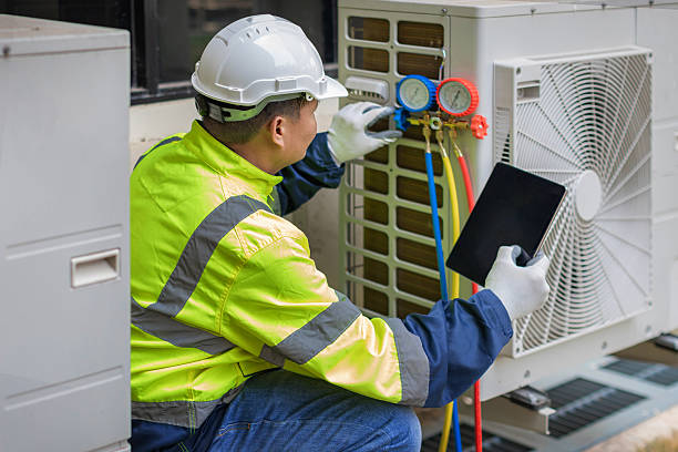Professional Air Conditioning Repair technician working in Hastings-on-Hudson, NY